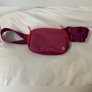 LULULEMON PINK LYCHEE/RIPENED RASPBERRY/HIGHLIGHT ORANGE EVERYWHERE BELT BAG